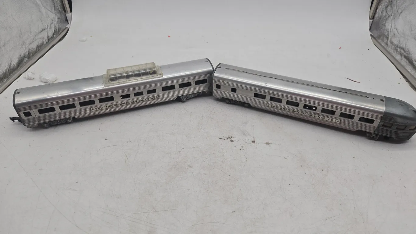 Vintage American flyer lines number 262 and number 263 aluminum passenger car and caboose