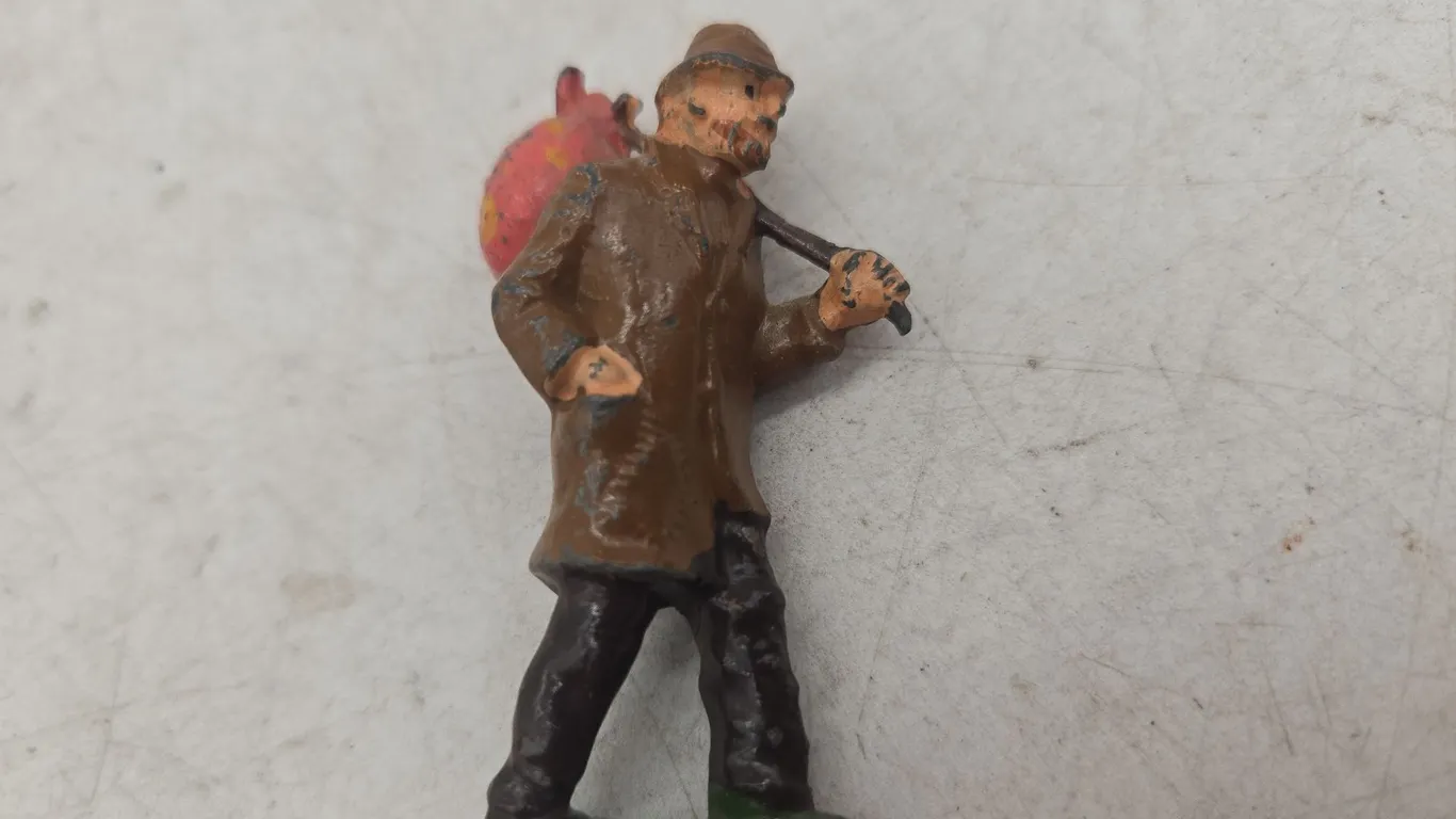 Antique Lead model railroad hobo figurine