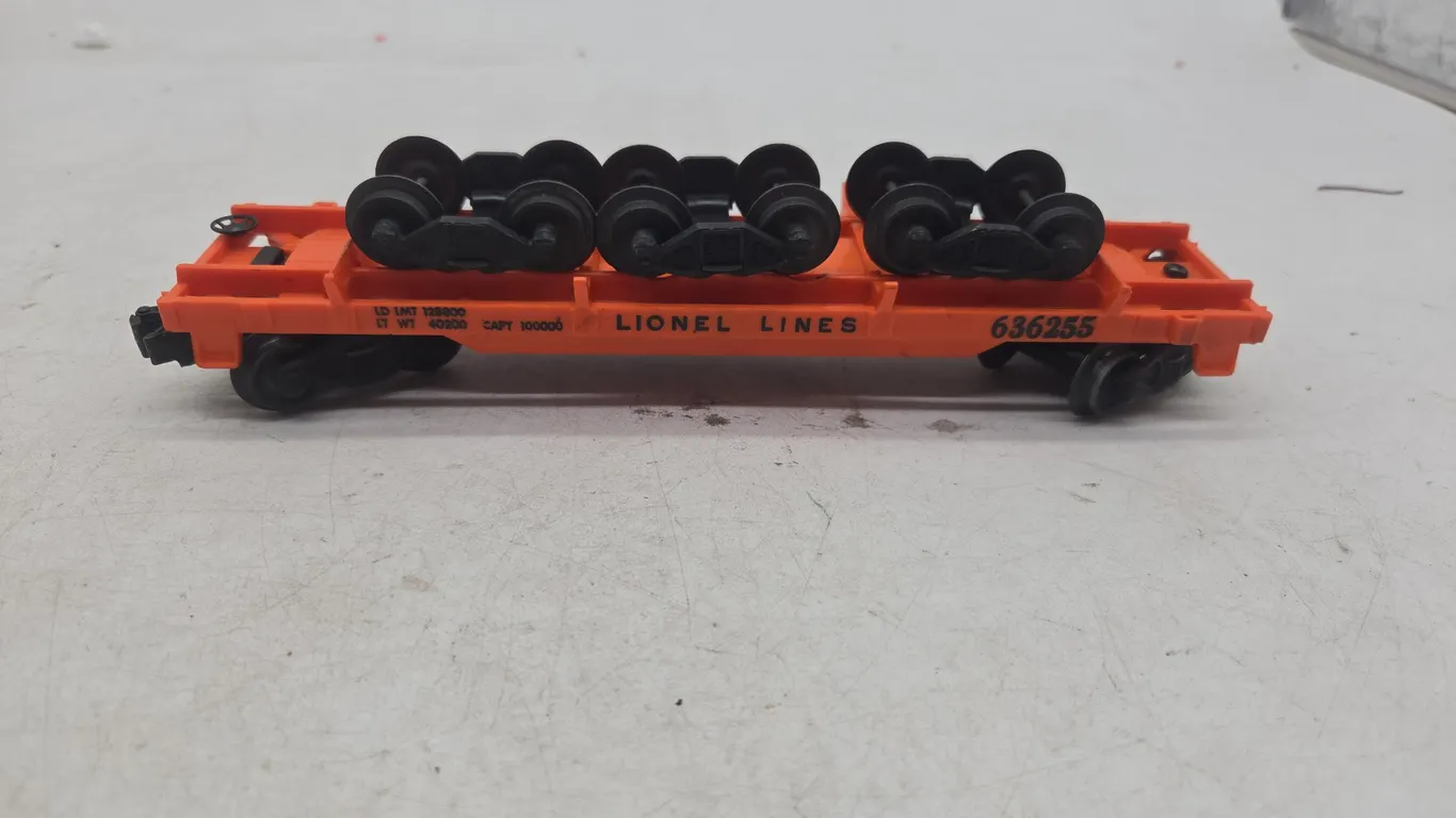 Vintage Lionel number 6362 flat car with wheel load