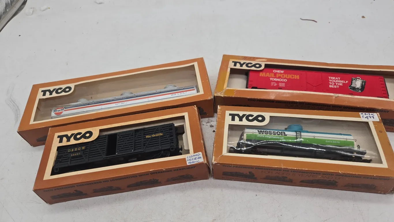 Assorted vintage Tyco HO scale train cars new in boxes
