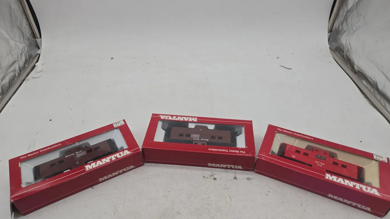 Assorted vintage Mantua heavy cabooses new in boxes