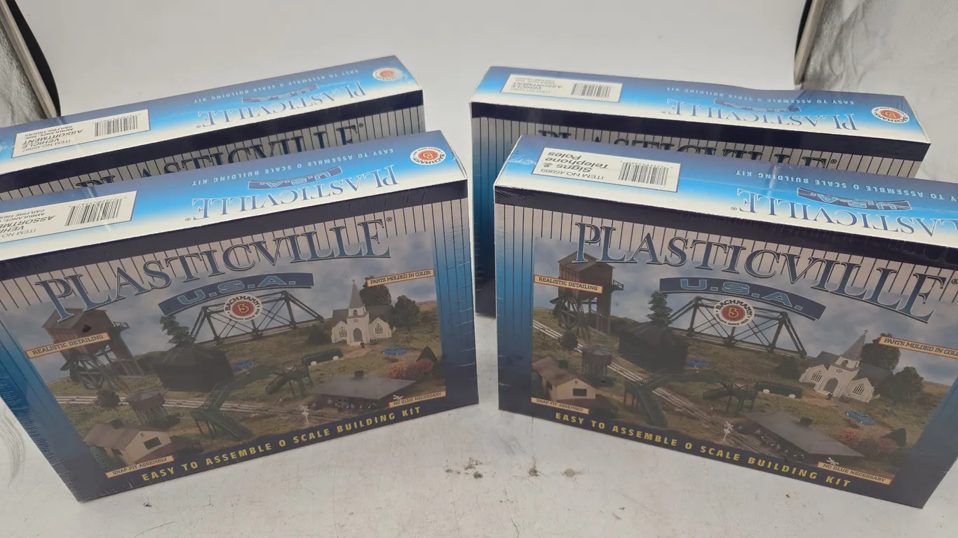 Assorted vintage plasticville easy to assemble building kits new and boxes