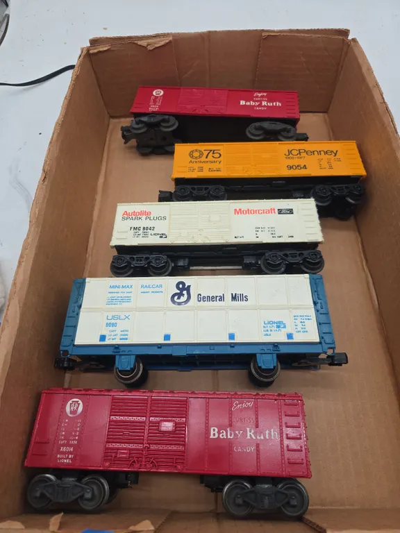 Assorted vintage advertising box cars