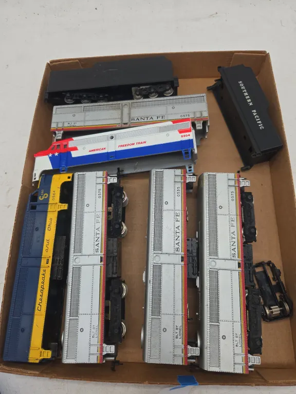 Assorted vintage HO scale locomotives b units and coal tenders in various conditions