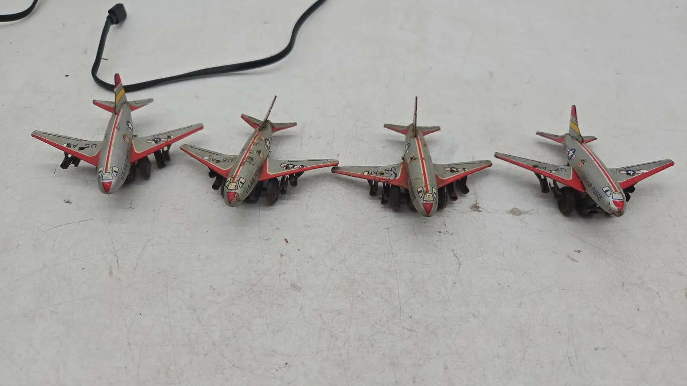 Vintage made in Japan metal lithograph miniature US Air Force planes