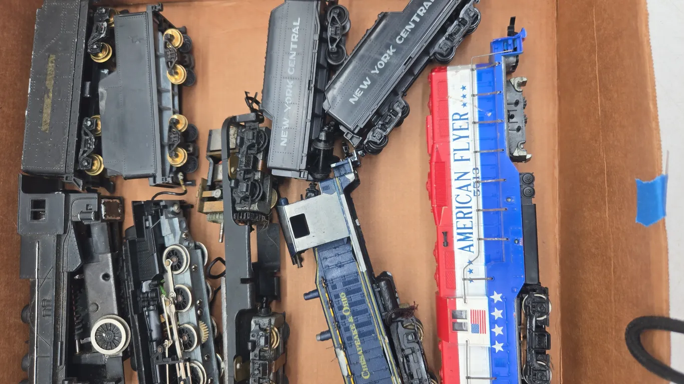 Assorted vintage HO scale locomotives in various conditions
