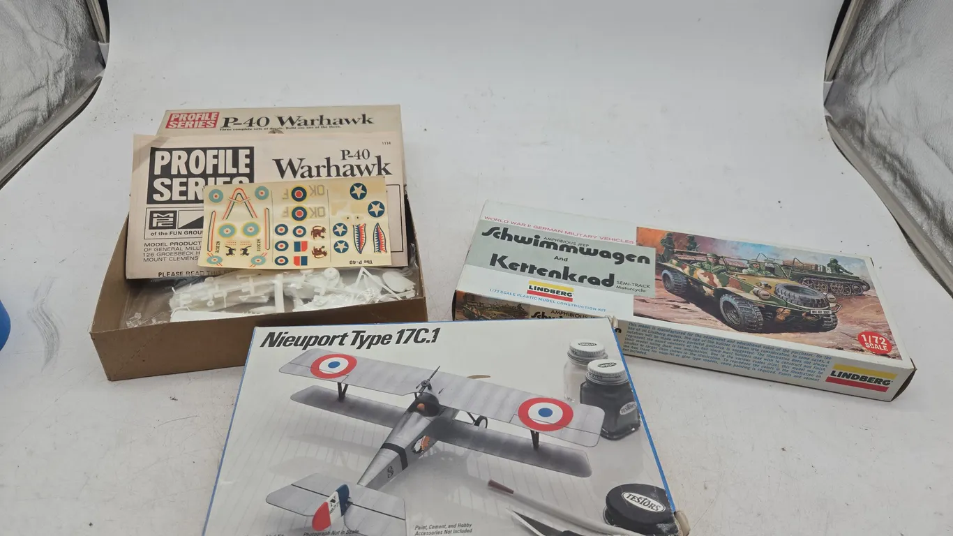 Assorted vintage world war II military models new in boxes