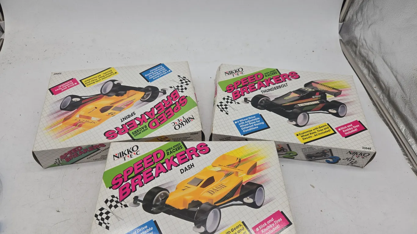 Assorted vintage speed breaker cars new in boxes
