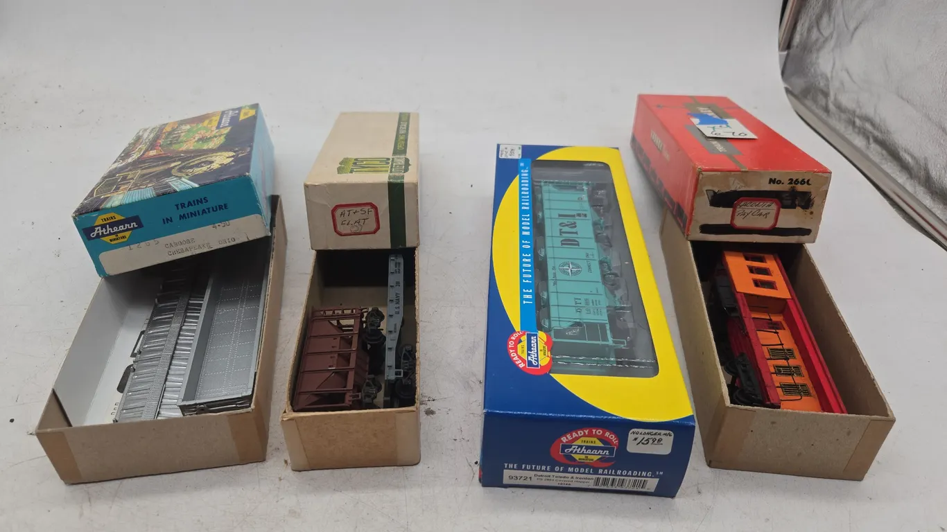 Assorted vintage train cars new in boxes