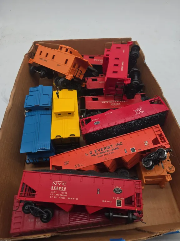 Large assortment of model train layout buildings and accessories