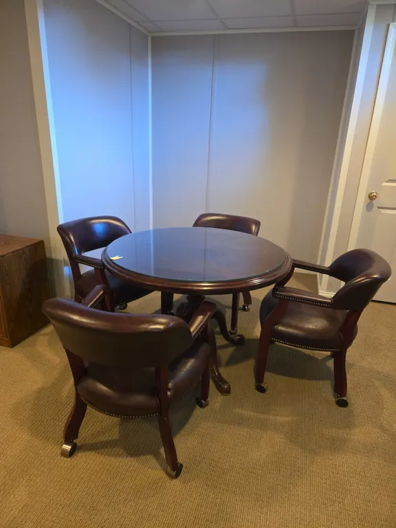 Vintage mahogany gaming table and 4 padded armed chairs