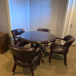 Vintage mahogany gaming table and 4 padded armed chairs