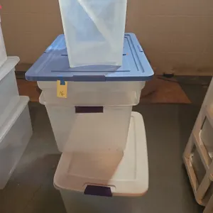 Assorted plastic storage totes