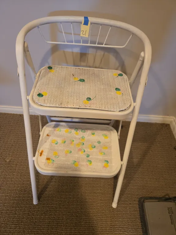 Vintage metal seated stepping stool