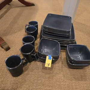 Gibson brand black dinnerware set