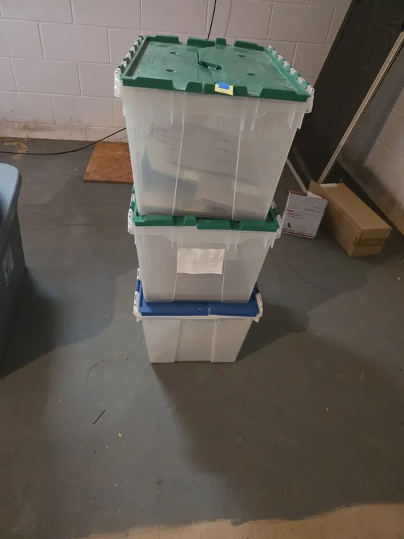 Assorted plastic storage totes