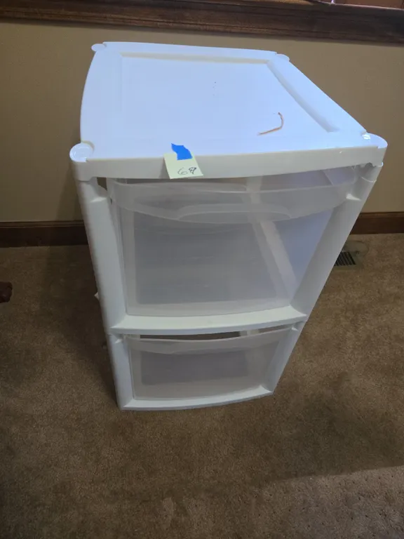 Plastic stack on storage tote