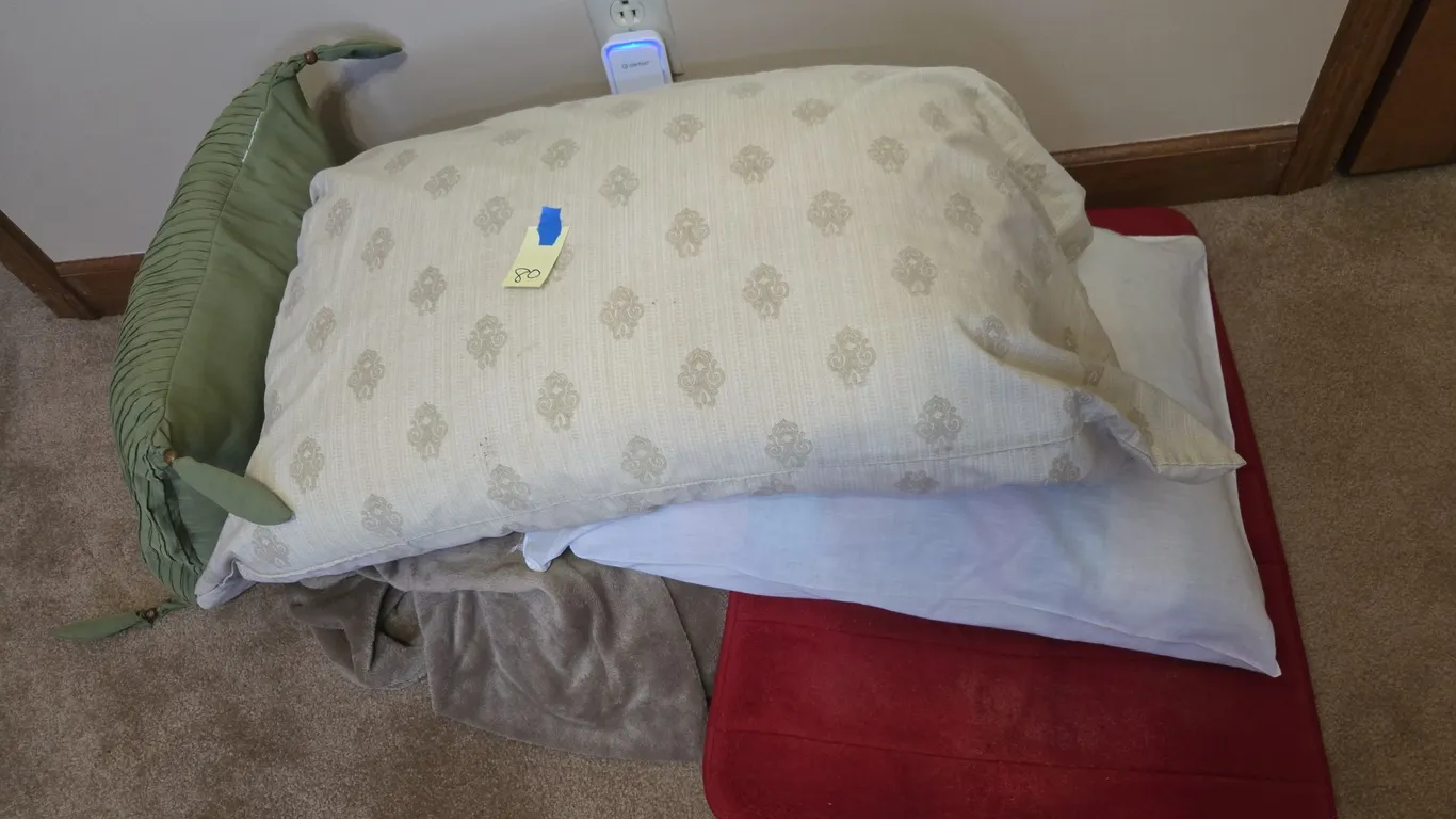 Assorted pillows and linens