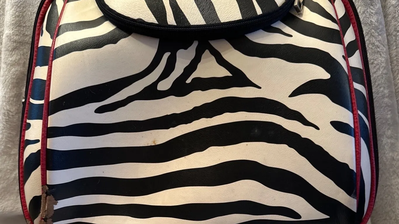 Black and White Zebra-Print Travel Bag with Red Accents