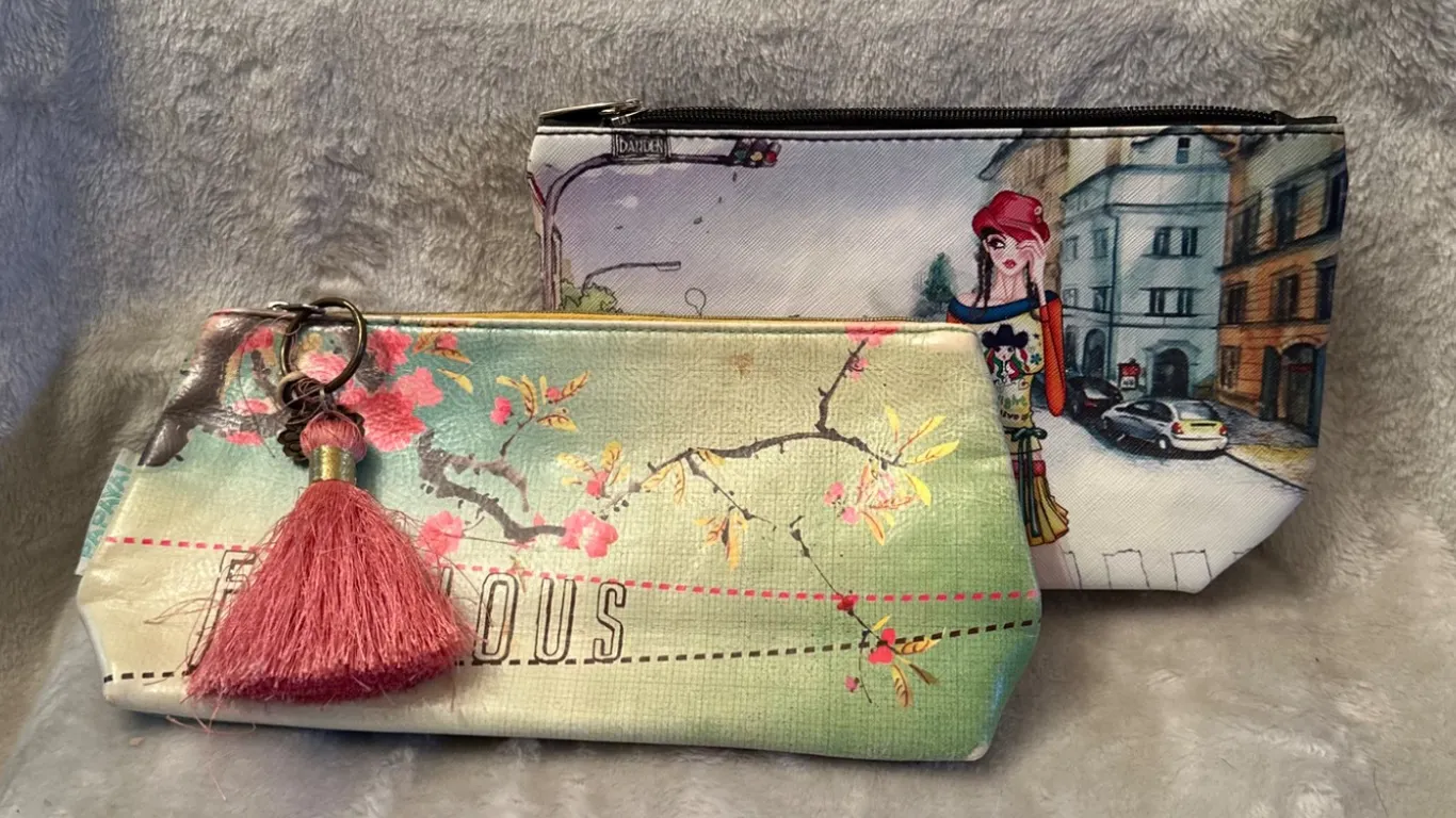 Two Fabric Cosmetic Pouches with Printed Designs