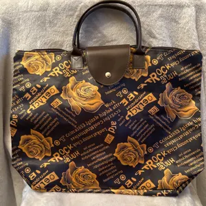 Black and Gold Tote Bag With Rose and Text Design