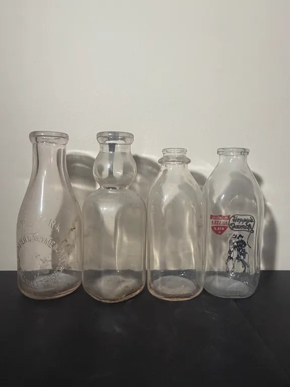 Vintage Glass Milk Bottles & Dairy Advertising Collection – Set of 4