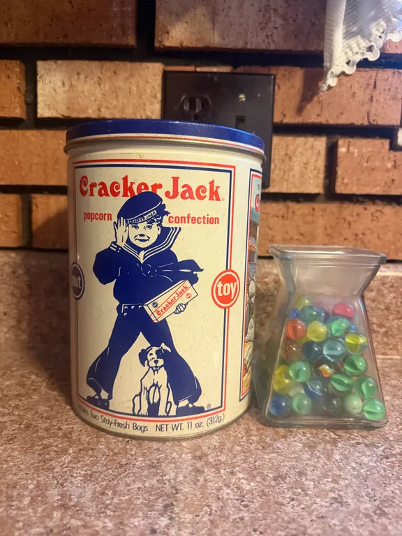 Vintage Cracker Jack Advertising Tin & Glass Marble Collection