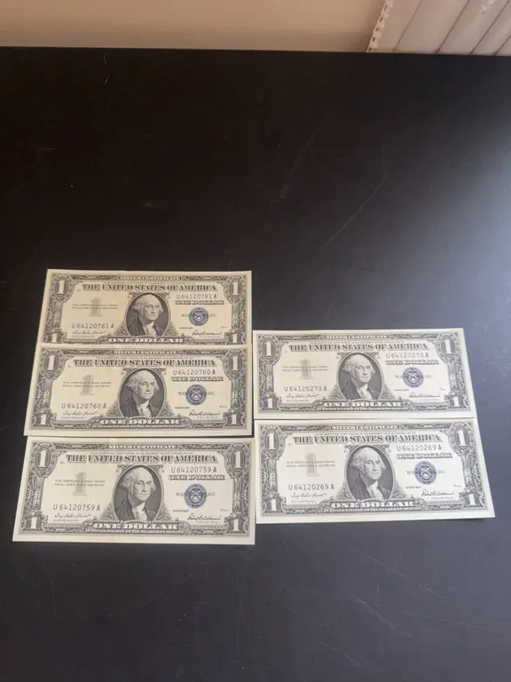 Five 1957 Series $1 Blue Seal Silver Certificates