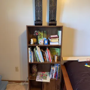 Wooden Bookcase with Books, Decorative Accessories & Metal Wall Décor