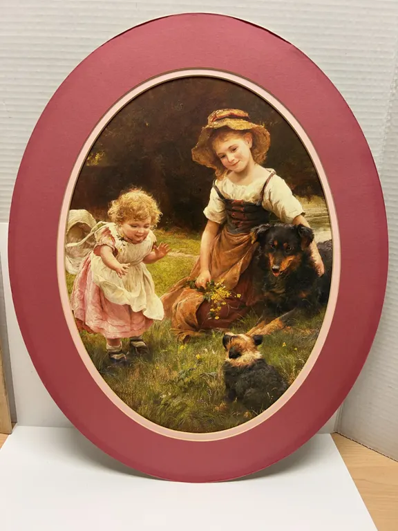 Framed Print of Two Children With Dogs in Oval Mat