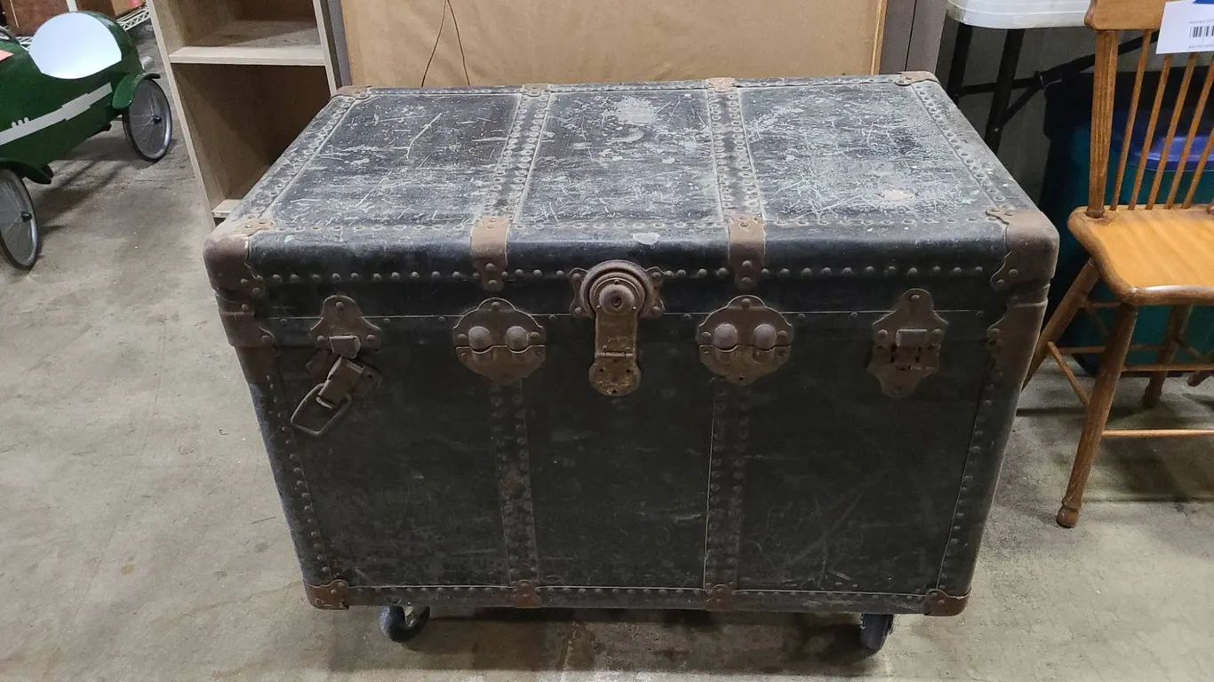 Steel-Bound Flat Top Steamer Trunk with W.H. Mann Marking