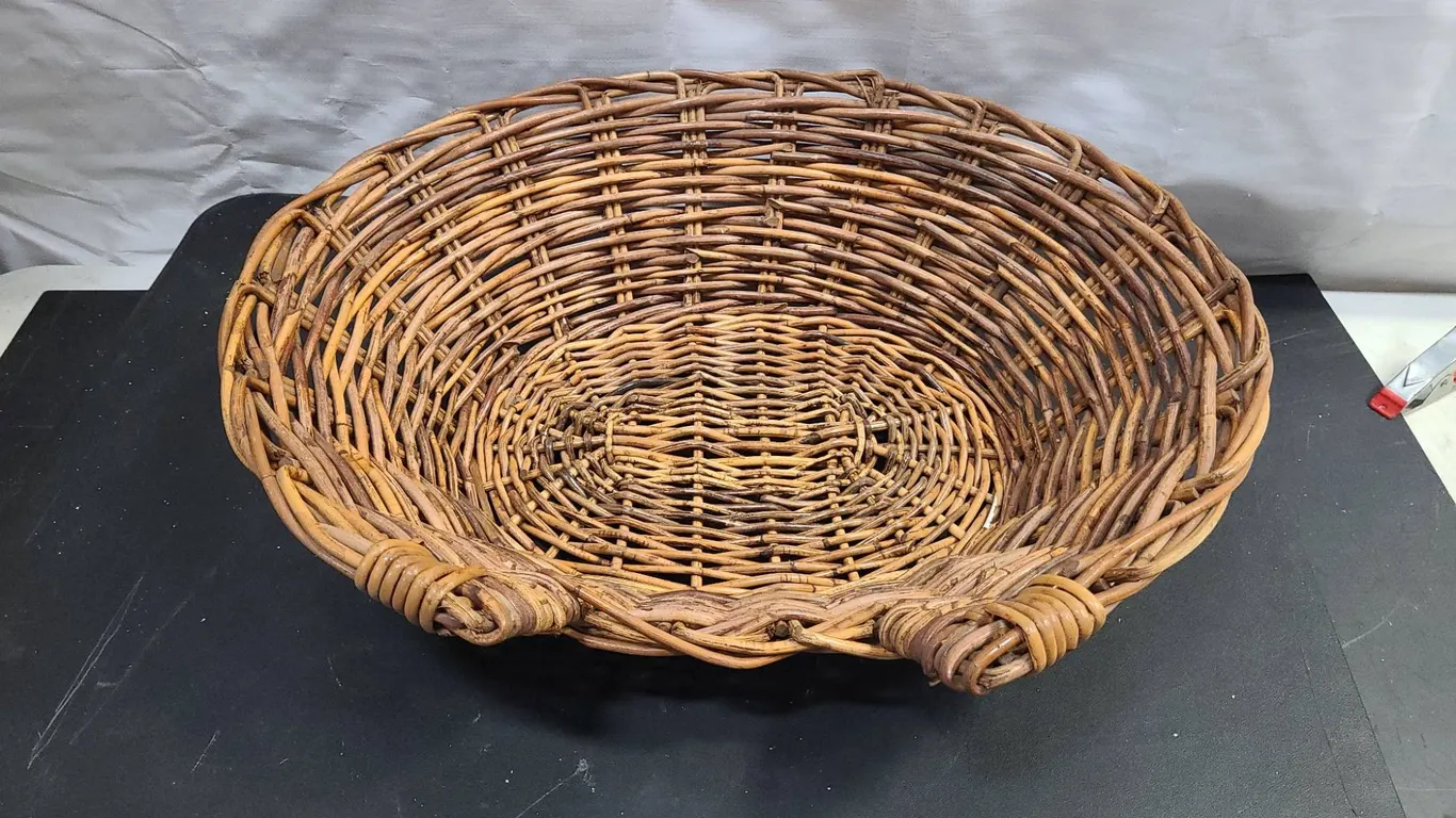 Large Woven Willow Basket with Cutouts and Reinforced Rim