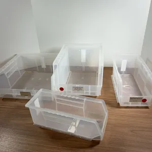 Four Clear Plastic Stackable Storage Bins