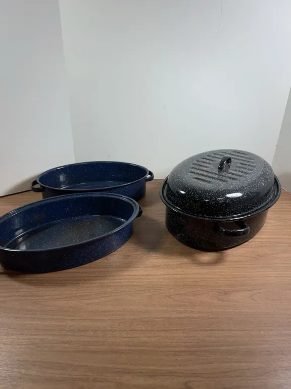 Three Oval Enamel Roasting Pans with Lids