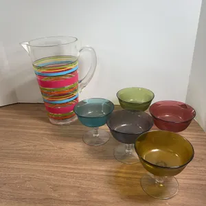 Striped plastic Pitcher with Five Colored Stemmed plastic Glasses dessert cups