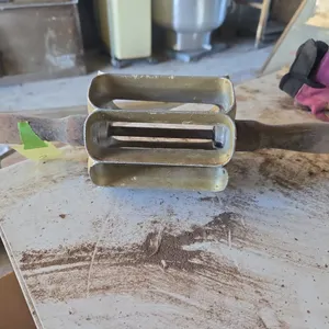 Vintage Houpt brand  Long John donut eclair cutter