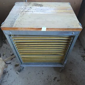 Vintage rolling bakery resting cabinet with butcher block top