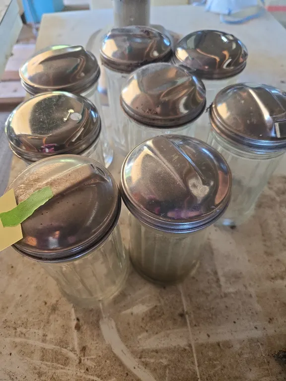 Vintage restaurant style chrome and glass sugar dispensers