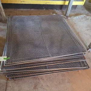 Vintage stainless steel donut deep frying screens
