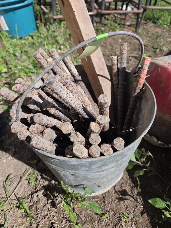 Bucket full of half inch rebar grade stakes