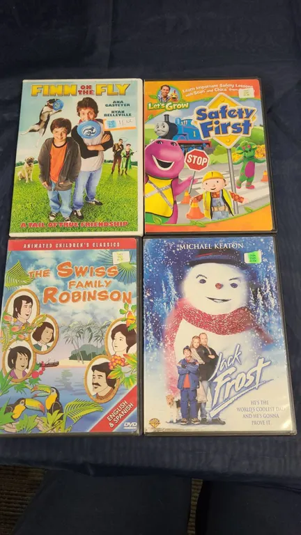 4 Family DVDs: Finn on the Fly, Safety First, Swiss Family