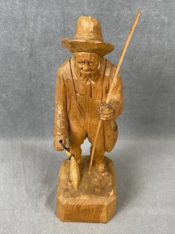 Small CARON Quebec Carving of Fisherman