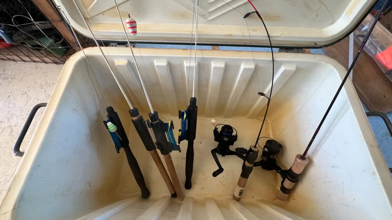 Vintage Coleman Cooler and Ice Fishing Poles