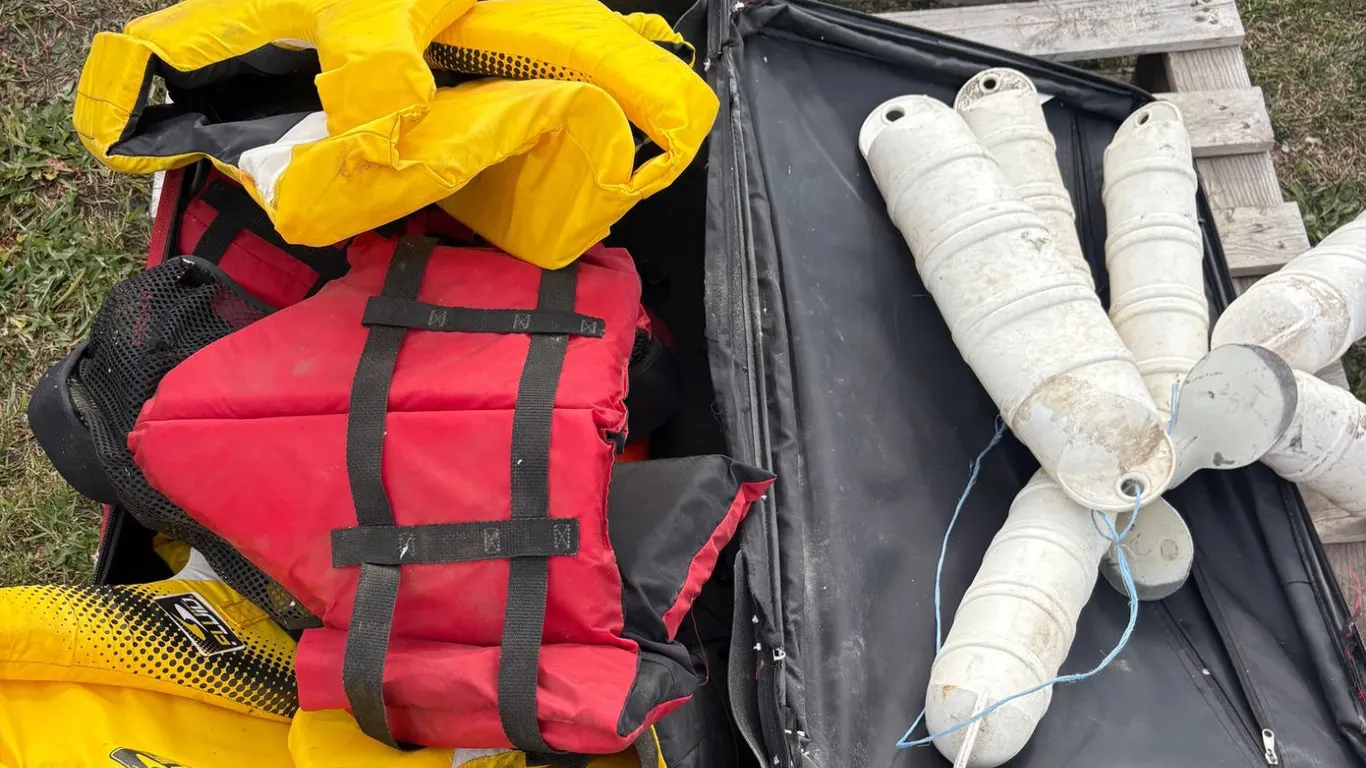 Four large life jackets, boat fenders