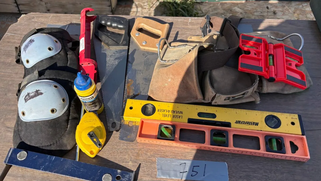 Levels, knee pads, hand saws, work belt, chalk line