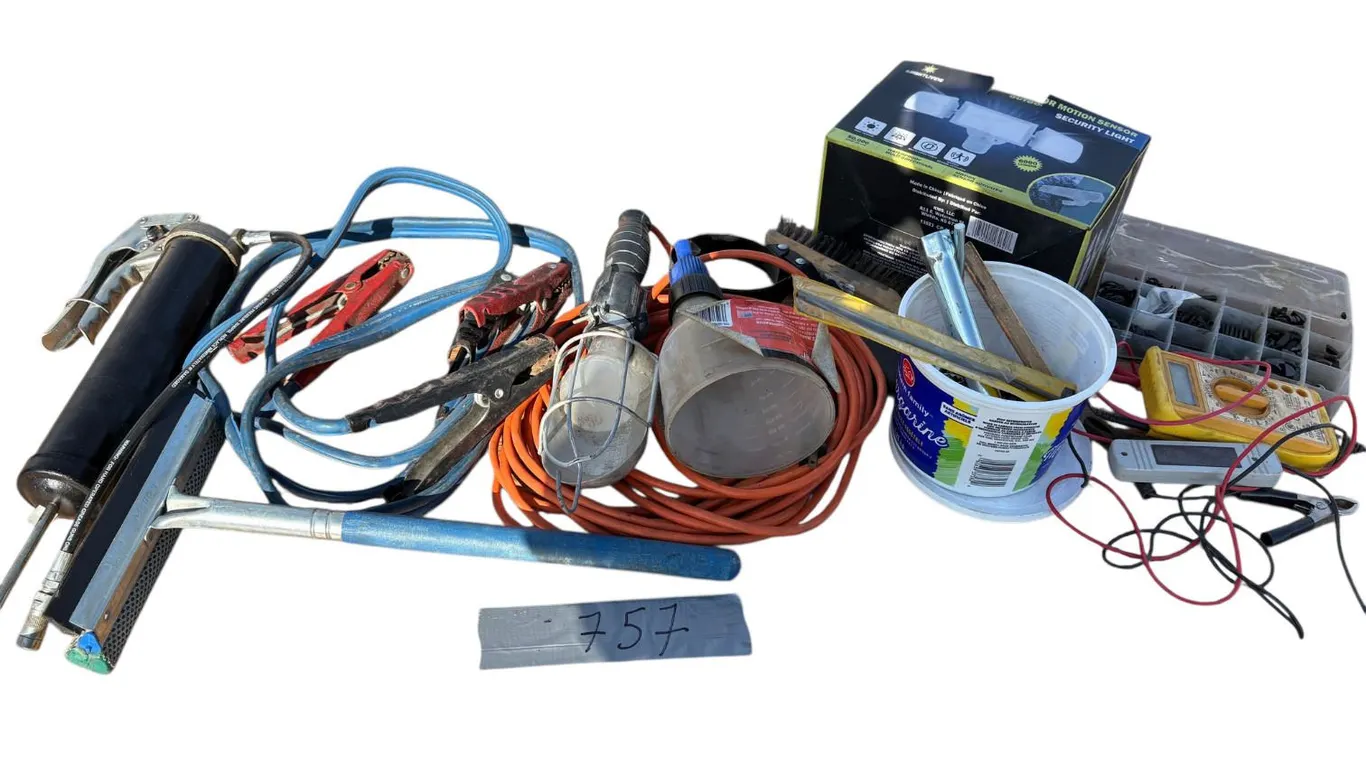 Grease gun, trouble light, booster cables, small sockets, motion light, electric testers, box of pul