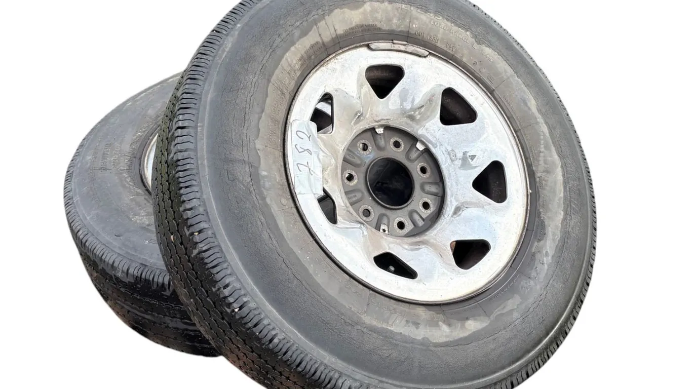 2 Ford truck tires on 7 hole rim 245 / 75R16