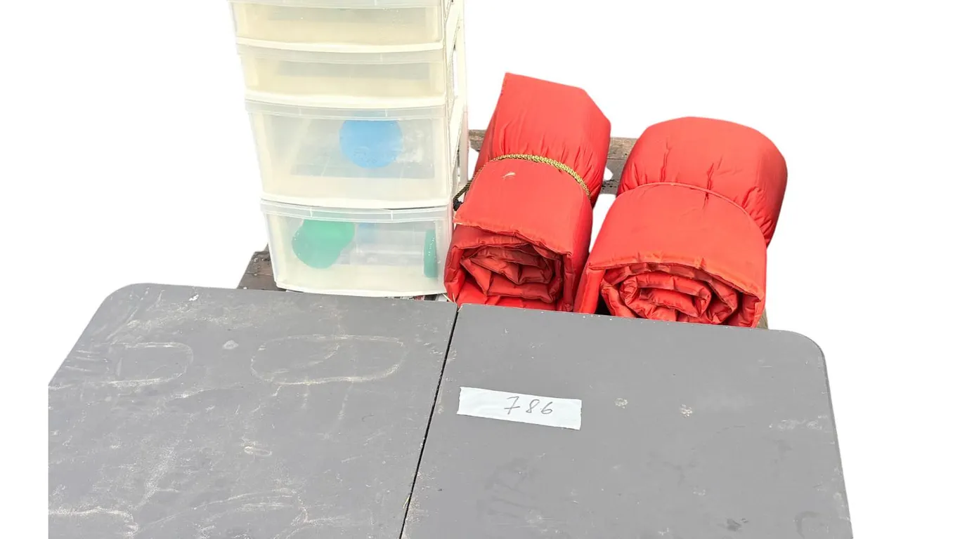 2 sleeping mattress, plastic storage container, folding table