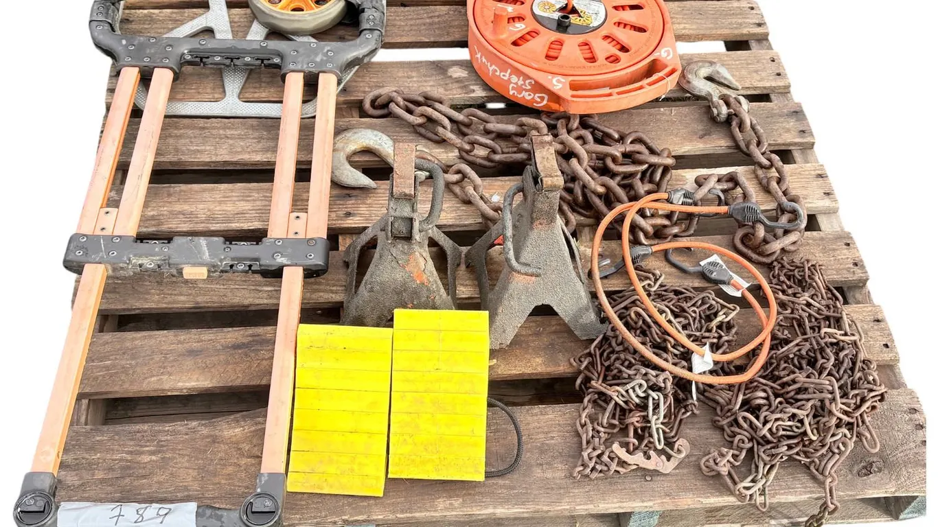 Dolly, extension cord reel with cords, 2 floor jack stands, tire chains, heavy duty log chain, trail