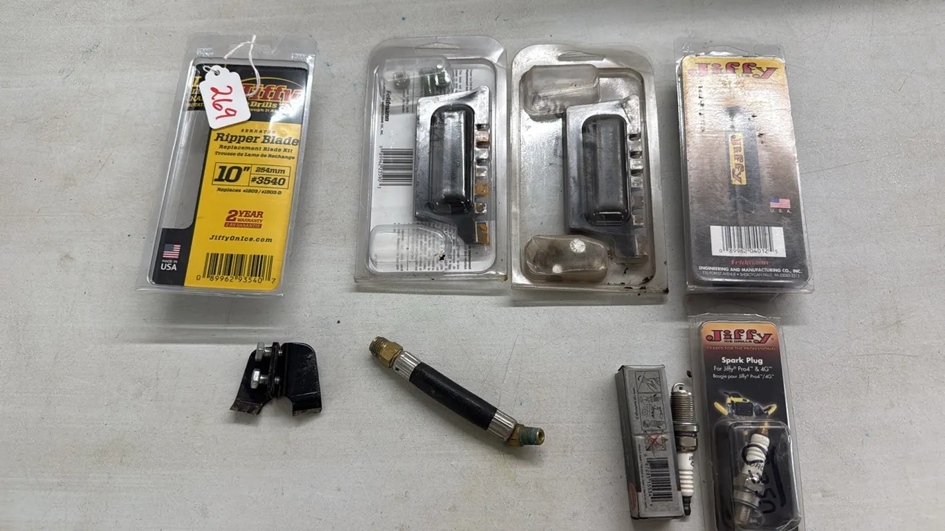 (1) Brand New Jiffy 10” Ripper Blade, (2) Used (Sharpened) 10” Jiffy Ripper Blades,(1) Jiffy Blade Sharpener, (1) Used Jiffy Starter Blades, (1) Jiff